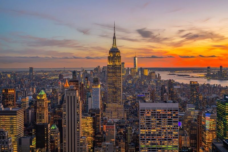 “At the edge of the Atlantic, Manhattan transforms ambition into architecture and twilight into electricity.”